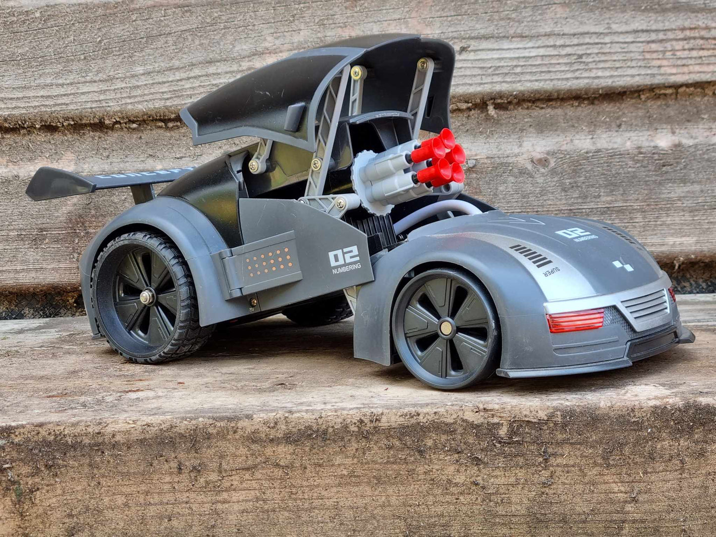 RC Stealth Shadow Nardo Grey Transforming Nerf Soft Dart Firing Race Car Radio Control Model Toy